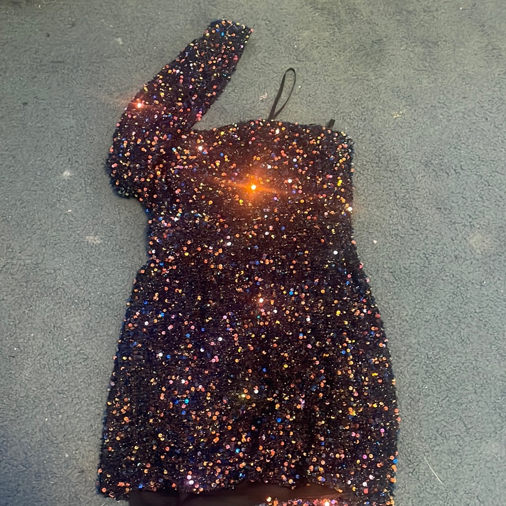 glitter skin tight dress size 3 with a whole bunch of diffrent colors.